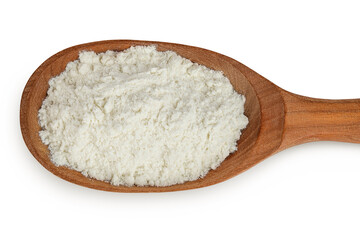 White flour in wooden spoon isolated on white background. Top view. Flat lay.