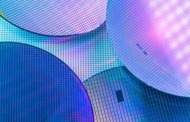 Silicon Wafers with microchips used in electronics for the fabrication of integrated circuits