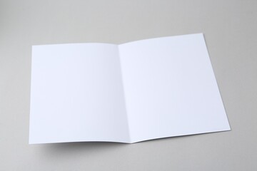 Blank greeting card on light background, closeup