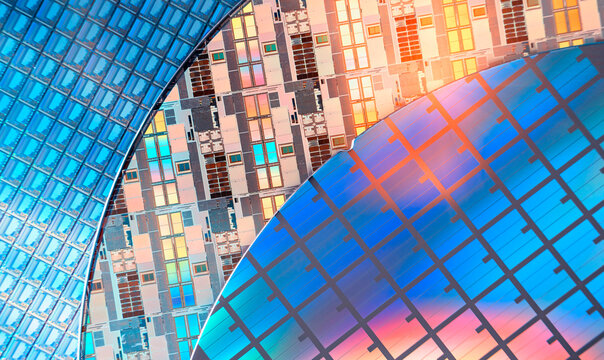 Silicon Wafers with microchips used in electronics for the fabrication of integrated circuits