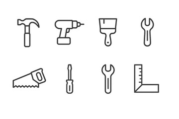 Hand tools and power tools arranged neatly on a white background for construction and repair work