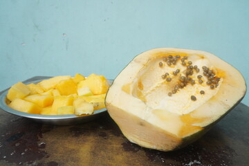 Papaya is a tropical fruit with sweet, orange flesh, rich in vitamins, enzymes, and antioxidants, promoting digestion and health.