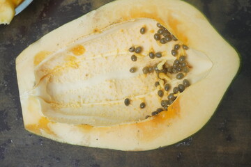 Papaya is a tropical fruit with sweet, orange flesh, rich in vitamins, enzymes, and antioxidants, promoting digestion and health.