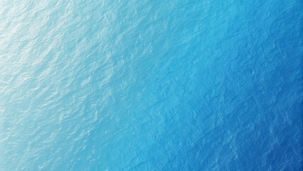 Aerial view of clear ocean water with texture and gradual color change