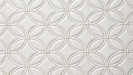Fototapeta premium Close up of a white leather quilted geometric pattern texture