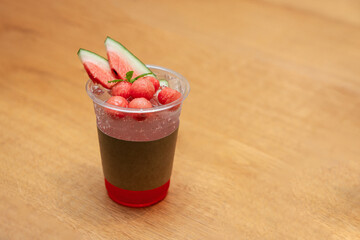 Refreshing Watermelon Soda Drink with Fresh Fruit on Wooden Table