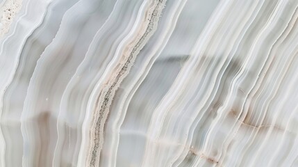 Obraz premium Close-up view of wonderful crema marble stone texture displaying soft beige tones, delicate veining, and smooth organic patterns, capturing the elegant and timeless beauty of natural stone surfaces.