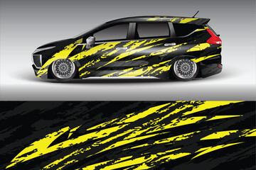 Stylish black and yellow car wrap design showcasing sleek vehicle