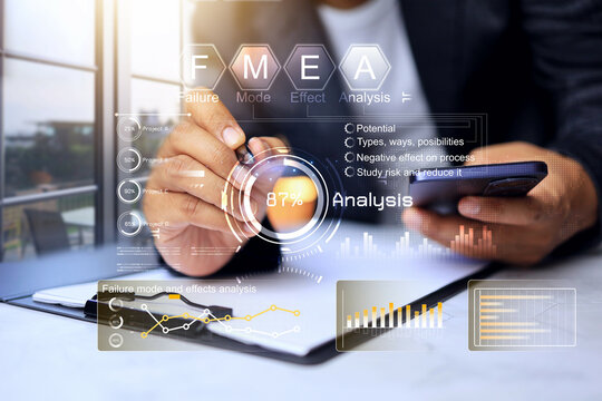 FMEA failure mode and effect analysis with businessman working to analyze cause of problem and find way to reduce and improve work process to better, raising production levels and reducing waste