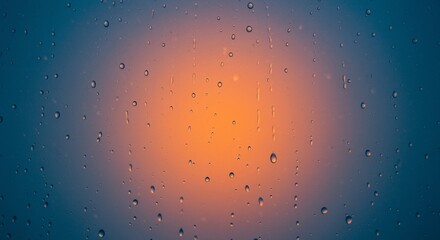 Water droplets on glass, vibrant sunset hues.