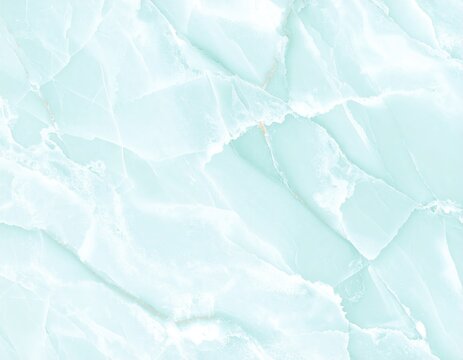 Une texture &eacute;l&eacute;gante de pierre de marbre onyx aqua, aux veines fluides et aux nuances translucides de bleu, vert et blanc, &eacute;voquant luxe et raffinement naturel.