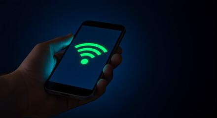 Hand Holding Smartphone Displaying Green Wifi Symbol on Blue Gradient Background Representing Seamless Connectivity