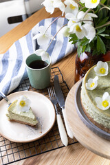 beautiful, appetizing mint cheesecake decorated with flowers