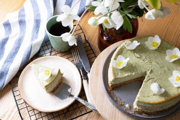 beautiful, appetizing mint cheesecake decorated with flowers
