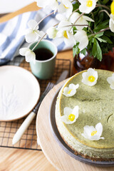 beautiful, appetizing mint cheesecake decorated with flowers