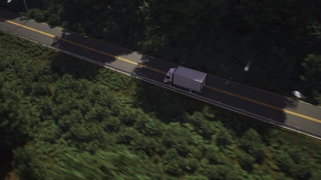 White logistics vehicle carrying the ordered supply items on the roadway. Logistics car transporting the supply goods on the roadway. Logistics company moving the supply chain products on a roadway.