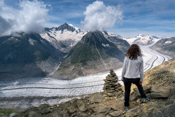 Woman while watching Aletsch glacier, Switzerland