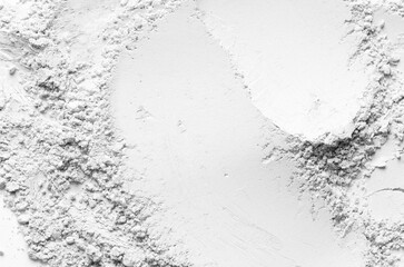 The texture of dry cosmetic clay for a skin mask.