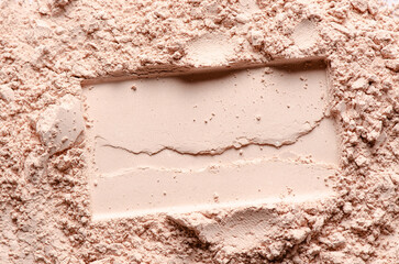 The texture of dry cosmetic clay for masks or cosmetic powder.