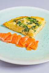 Enjoy a spinach frittata with smoked salmon for a touch of culinary elegance
