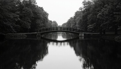 Park bridge over calm water