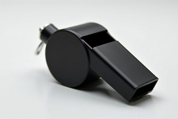 Classic black plastic whistle, simple design, clean background , safety, equipment