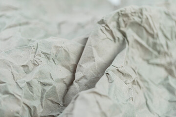 Obraz premium Close-up of textured, creased fabric with an aged appearance, suitable for marketing materials to evoke warmth, comfort, or history