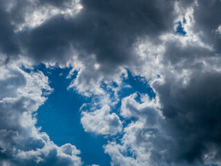 Dramatic Sky with Contrasting Clouds and Blue Patches
