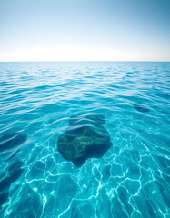 crystal-clear turquoise sea shimmering under the sun. with white shades