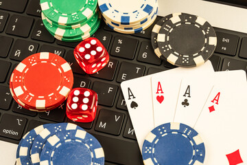 Image of casino items playing cards, dice, chips, cards deck on a table or gaming surface for promotional use in casinos, online gambling platforms, poker tournaments