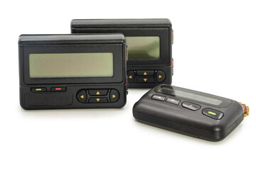 Old fashioned pagers showcasing classic communication devices from the 1990s era