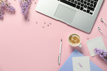 Flat lay composition with stationery and flowers on pink background, space for text