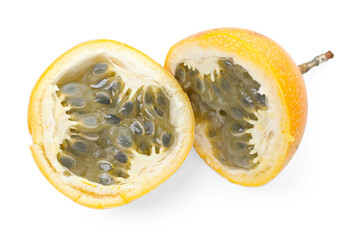 Pieces of ripe yellow passion fruit isolated on white