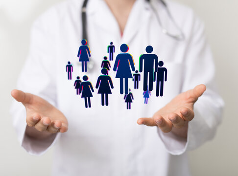 Image of a doctor's hands gently cradling diverse patient icons, symbolizing healthcare inclusivity and patient care.