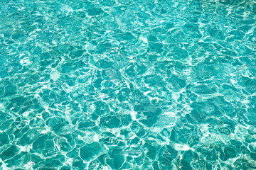 blue Wavy water surface background of swimming pool. Beautiful blue aqua surface of a swim pool ,...