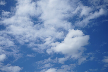 Fototapeta premium Blue sky with fluffy clouds.