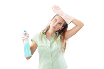 Tired woman wearing rubber gloves, holding a spray bottle and touching her forehead. Looking sideways, bored and exhausted by house cleaning routine. Isolated on white background.