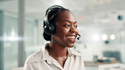 Happy, black woman and consultant with headset at call center for online communication or customer service. Female person, agent or smile with technology, mic or help for virtual assistance at office