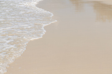 Soft wave on sandy beach. Background