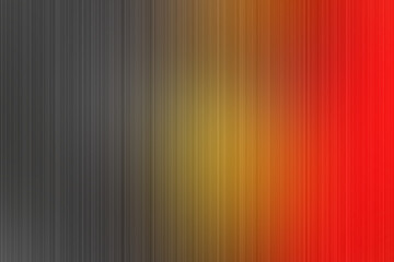 Abstrakcyjny gradient w kolorach czarnym, żółtym i czerwonym z pionowym efektem rozmycia i subtelną teksturą