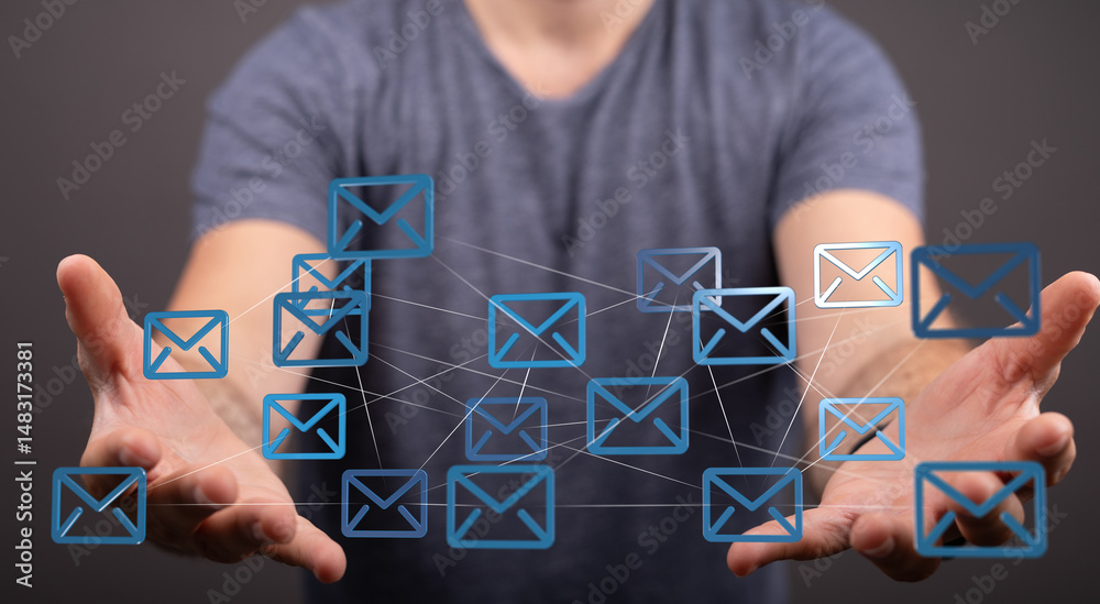 Poster Man's hands display a network of email icons, symbolizing global communication and connectivity.
