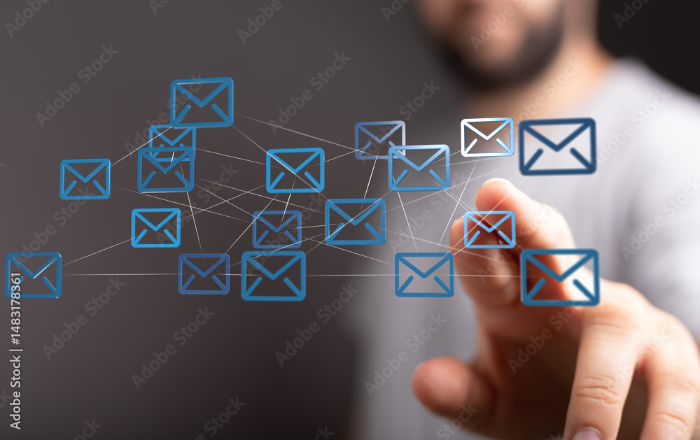 Aufkleber Man interacts with a digital network of email icons, representing global communication and connection.