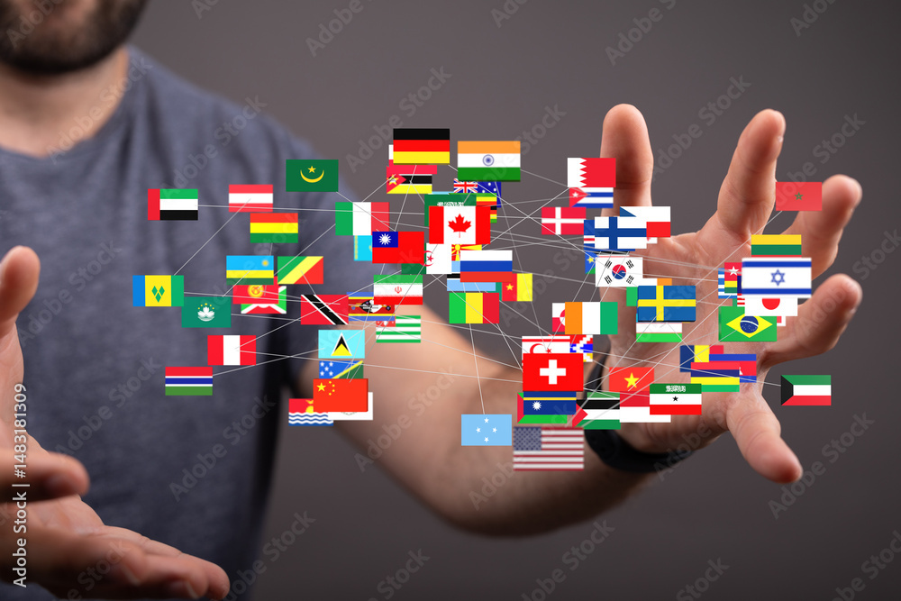 Fototapete Image of hands holding a network of interconnected flags representing global connectivity.