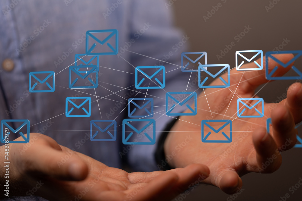 Poster Image of interconnected email icons above hands, symbolizing global communication and networking.