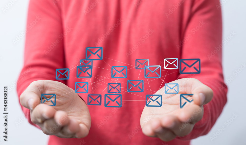 Aufkleber image of hands holding a network of email icons, representing communication and connectivity.