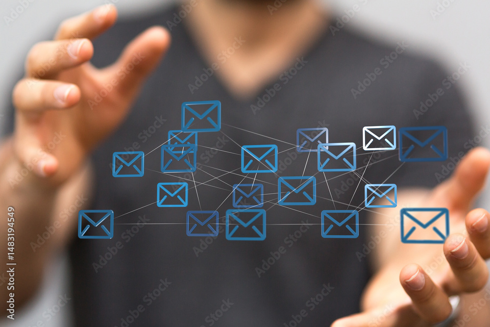 Poster Image of a person's hands interacting with a network of email icons, representing global communication and connection.
