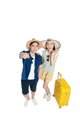 full body image of asian couple wearing travel clothes, pull suitcase and posing on background , top view