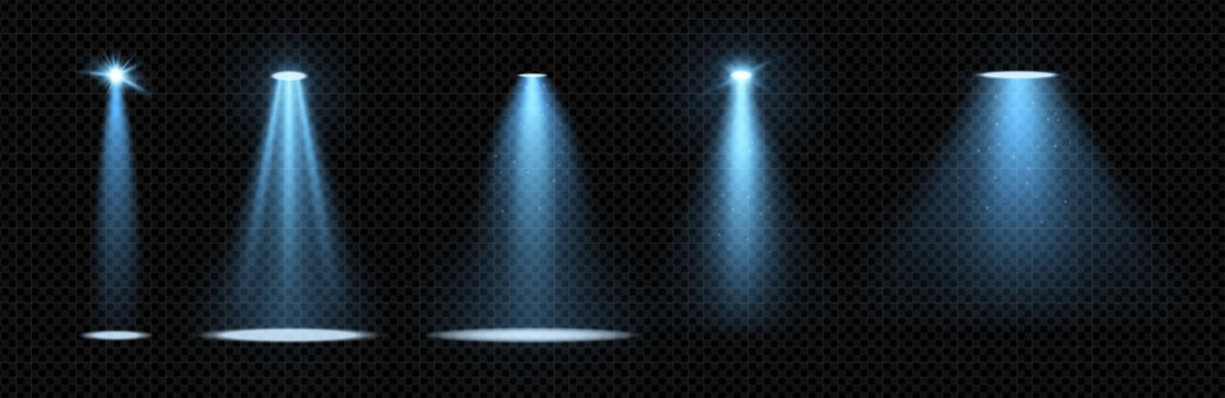 Blue spotlight set with glowing beams on dark background. Realistic volumetric vector effect for stage, concert or nightclub scenes. Sparkling glare and flash for dynamic entertainment design.