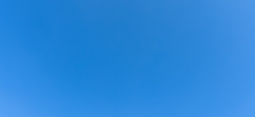 Beautiful light blue sky without clouds in the morning or afternoon on sunny day used as natural background texture in decorative art work
