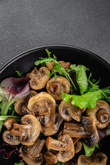 Champignon mushrooms pickled salad snack fresh gourmet food background on the table rustic food top view copy space vegetarian vegan food